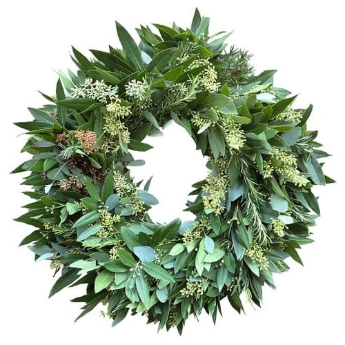 This mixed greenery wreath is such a perfect front door wreath for spring! #ABlissfulNest