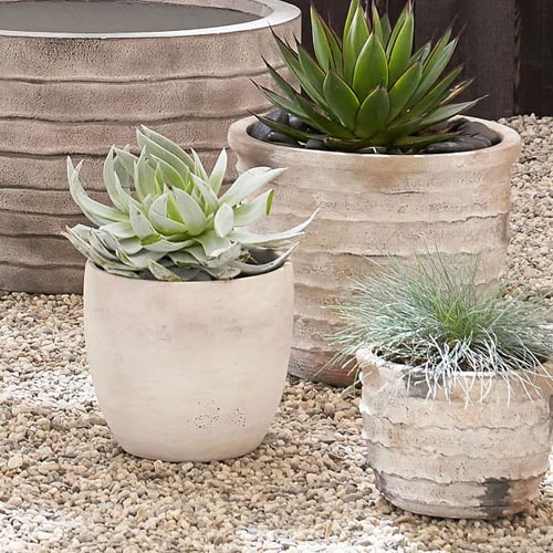 These artisan terra cotta planters are so beautiful for your outdoor living space this summer! #ABlissfulNest