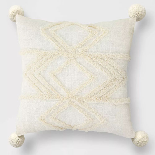 This textured throw pillow is a perfect neutral throw to add to your patio this spring! #ABlissfulNest