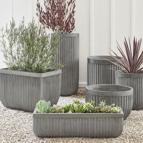 These concrete planters are so perfect for your outdoor living space! #ABlissfulNest