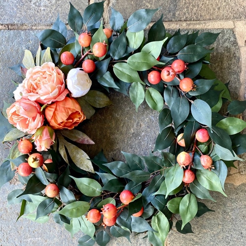 This peony and berry wreath is gorgeous for your front door this summer! #ABlissfulNest