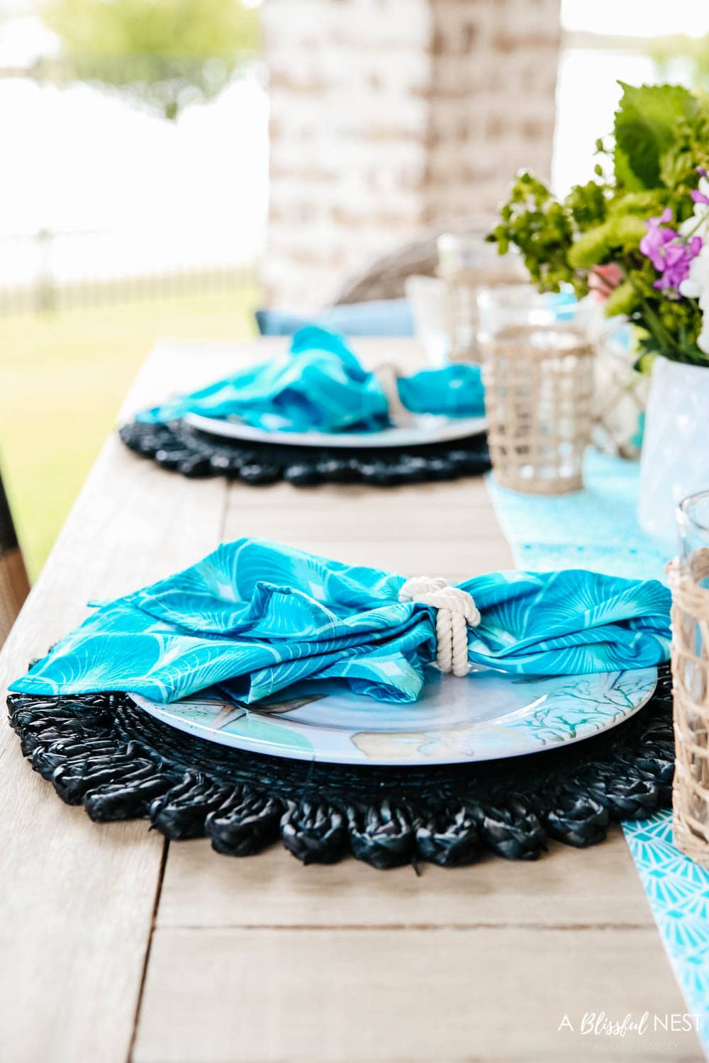 Bright pops of turquoise and coastal table decor. #ABlissfulNest #HobbyLobbyFinds #ad