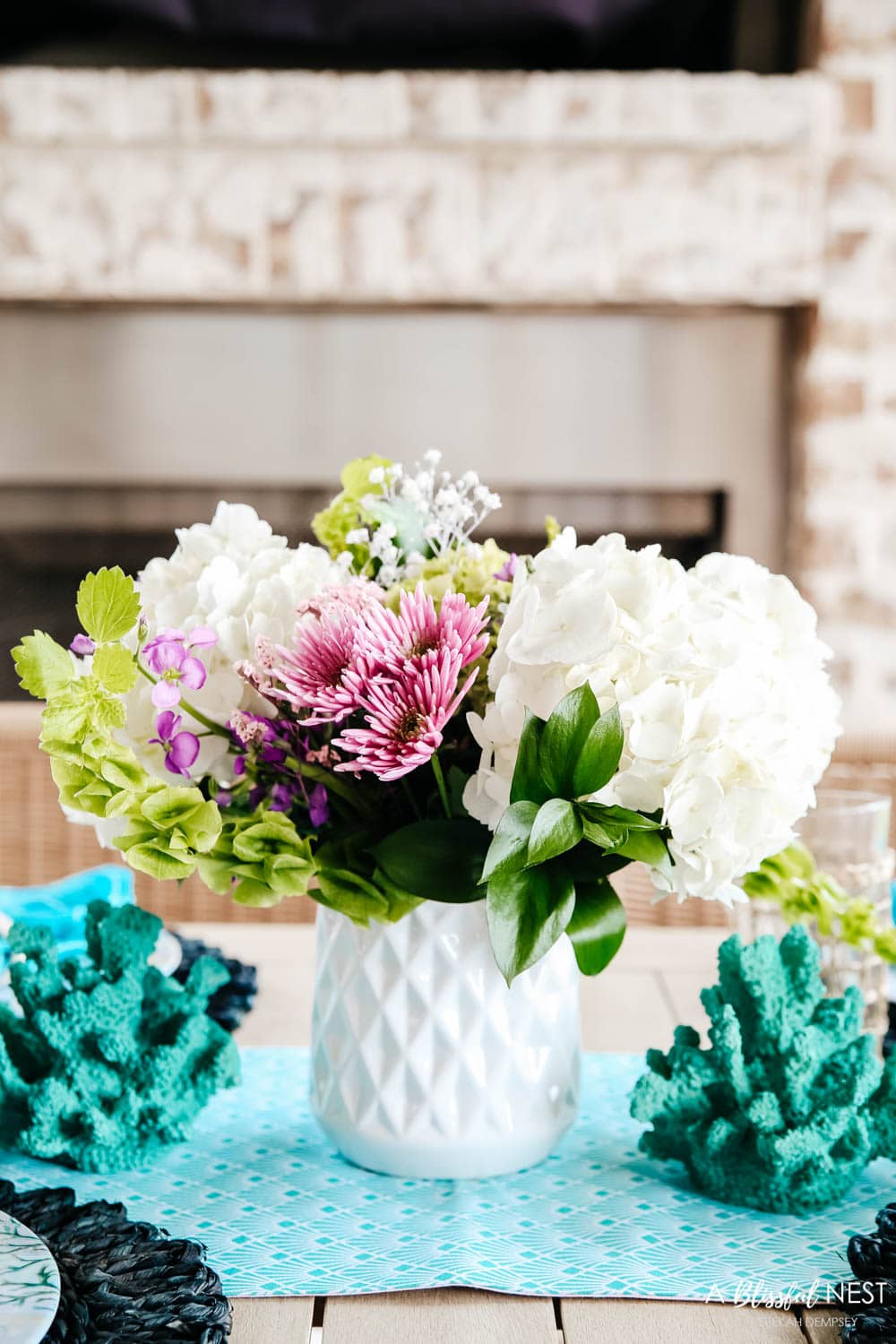 Bright pops of turquoise and coastal table decor. #ABlissfulNest #HobbyLobbyFinds #ad