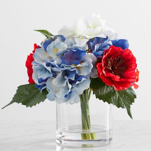 This faux floral arrangement is the prettiest patriotic addition to your outdoor table this summer! #ABlissfulNest