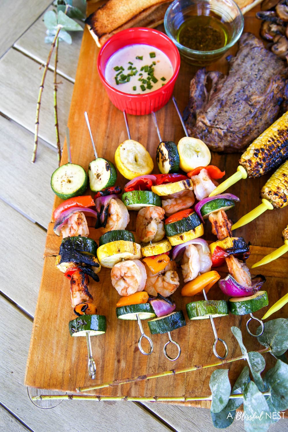 Turn your bbq and grilling recipes into a summer grilling charcuterie board! #ABlissfulNest #charcuterieboard #appetizers