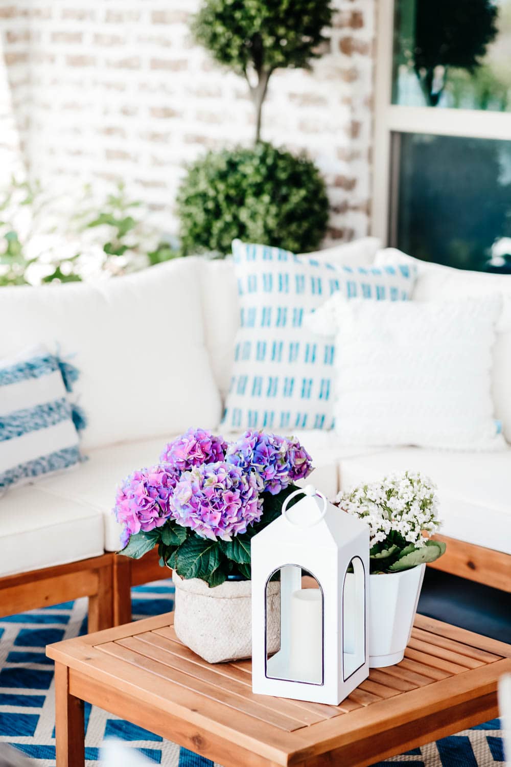 Summer patio sectional, outdoor table, outdoor television, outdoor seating ideas. #ABlissfulNest #summerpatio #patiodecor