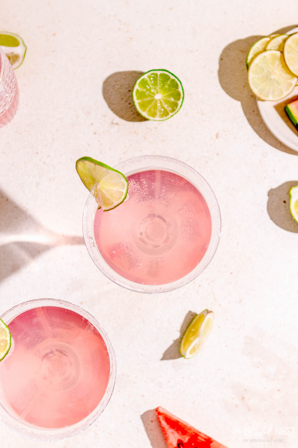 This watermelon lemonade martini is delicious for the summer or when having a small party. #ABlissfulNest #drinkrecipe #watermelon