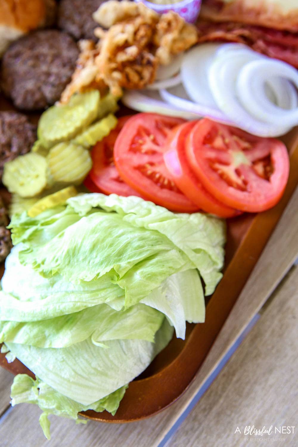 Make this epic summer hamburger charcuterie board with all these must-have ingredients. #ABlissfulNest #charcuterieboard #summerrecipe #summerfood