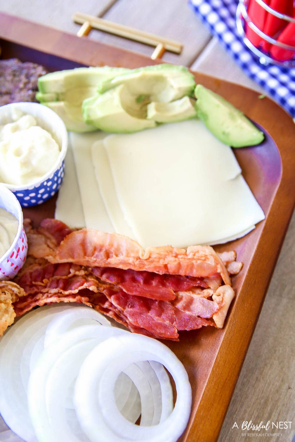 Make this epic summer hamburger charcuterie board with all these must-have ingredients. #ABlissfulNest #charcuterieboard #summerrecipe #summerfood
