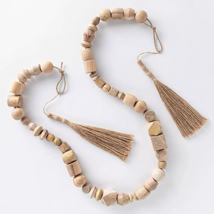 This decorative wooden bead garland is a perfect piece of decor to add into your home! #ABlissfulNest