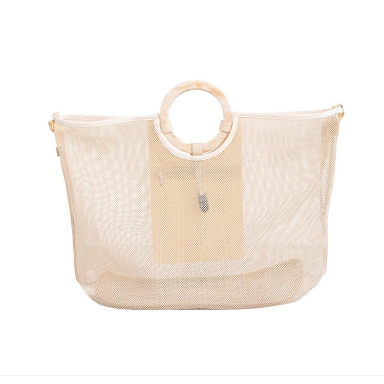 This mesh beach tote is perfect for your next trip to the beach! #ABlissfulNest