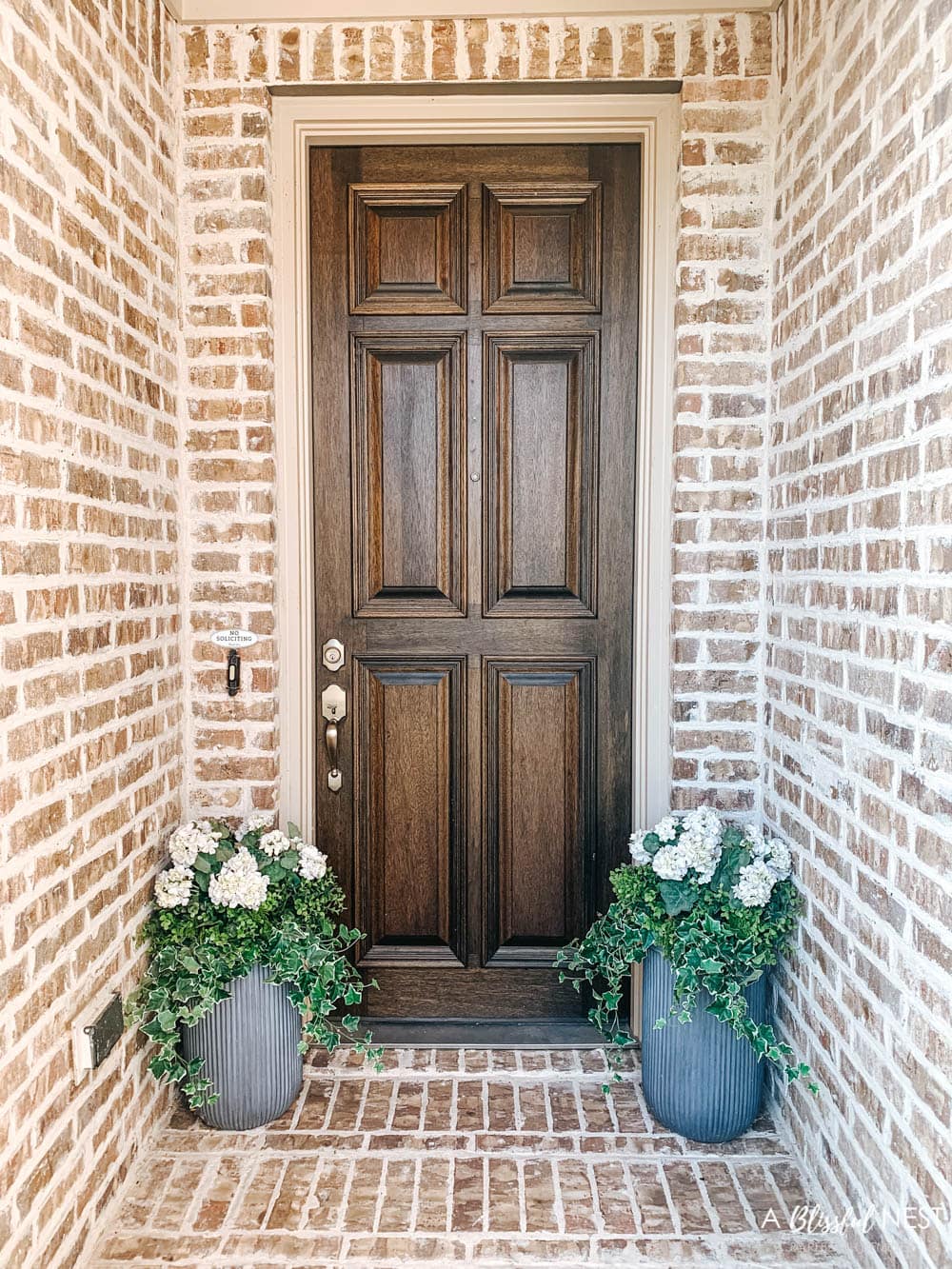 A small fall porch makeover with affordable finds from pumpkins, lanterns, fall wreath, and more. #ABlissfulNest #HobbyLobby #HobbyLobbyFinds #ad #fallporch #falldecor