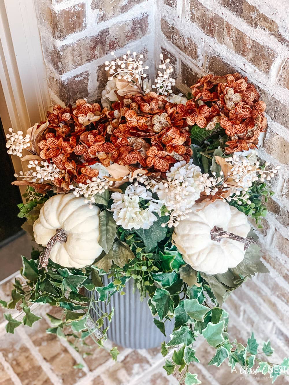 A small fall porch makeover with affordable finds from pumpkins, lanterns, fall wreath, and more. #ABlissfulNest #HobbyLobby #HobbyLobbyFinds #ad #fallporch #falldecor