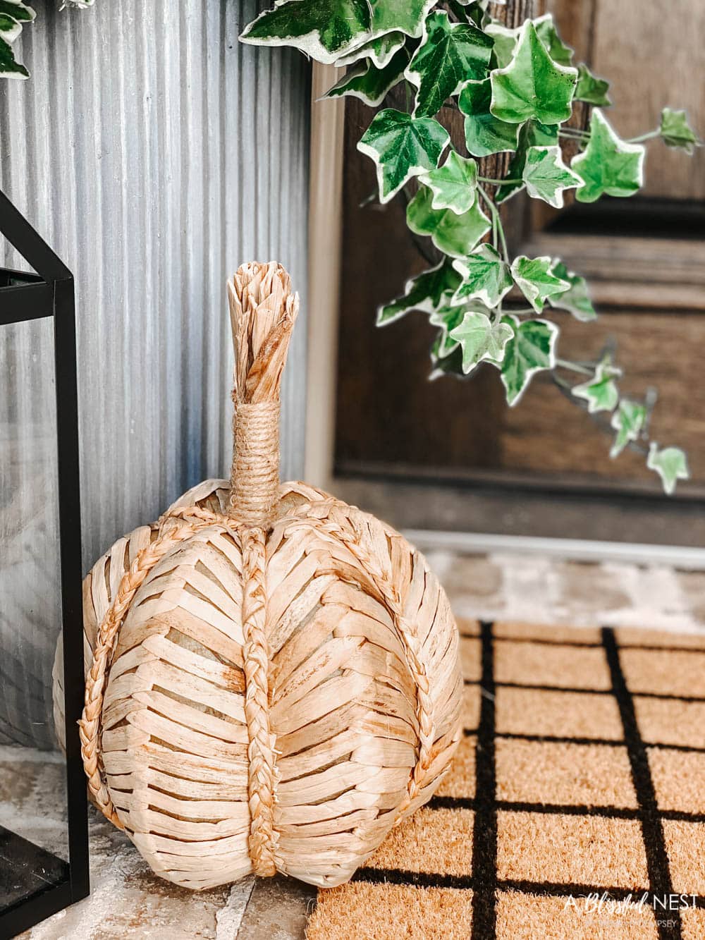 A small fall porch makeover with affordable finds from pumpkins, lanterns, fall wreath, and more. #ABlissfulNest #HobbyLobby #HobbyLobbyFinds #ad #fallporch #falldecor