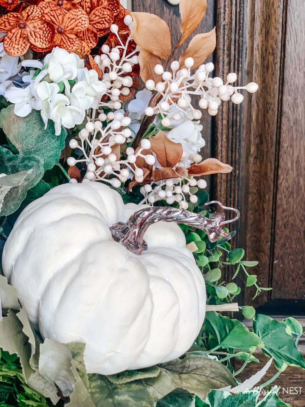 A small fall porch makeover with affordable finds from pumpkins, lanterns, fall wreath, and more. #ABlissfulNest #HobbyLobby #HobbyLobbyFinds #ad #fallporch #falldecor