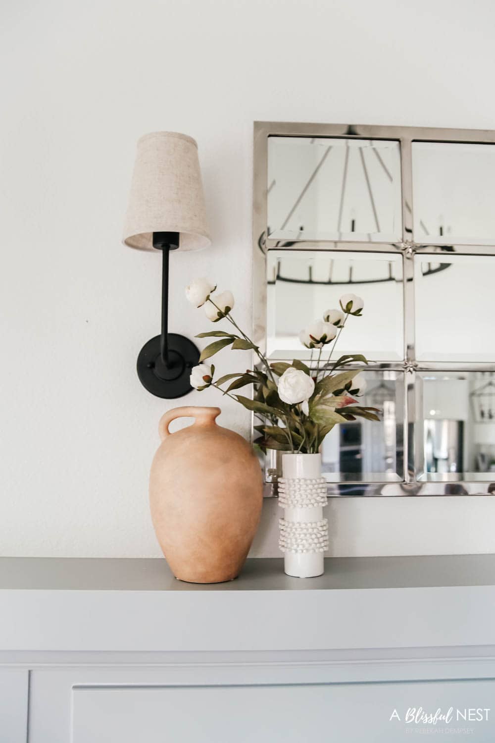 Add warm toned accent decor like vases and bowls. #ABlissfulNest #falldecor #fallideas