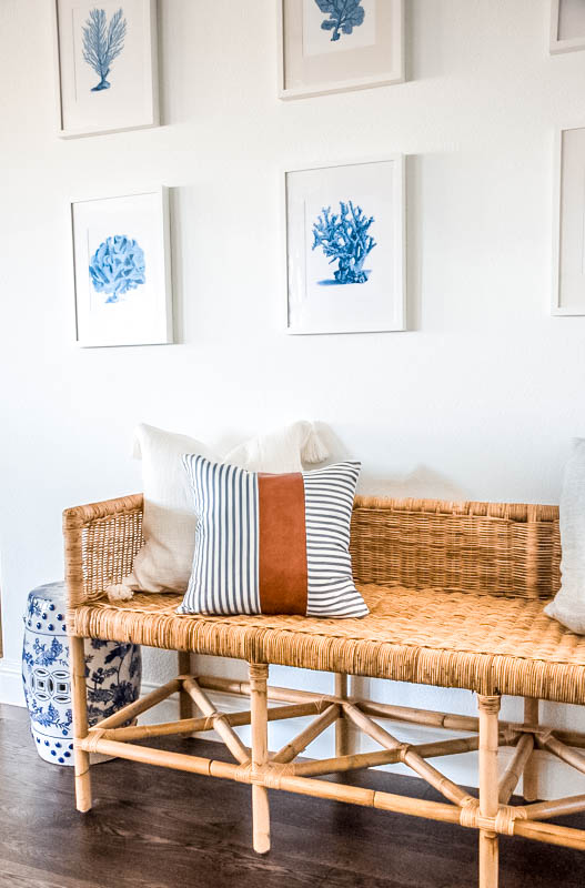 This leather and blue and white striped pillow is the easiest pillow to transition into any decor. #ShopABlissfulNest #pillowstyle #designtips