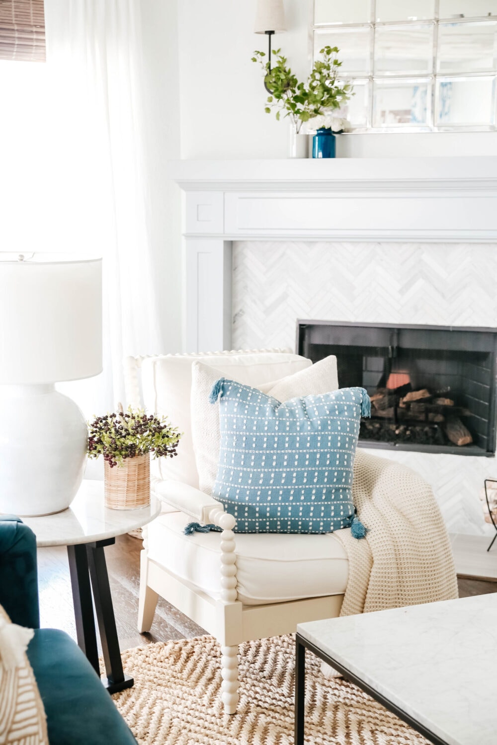 Shop our beautiful new pillow with white stitching to create that coastal decor style in your home. #ShopABlissfulNest #livingroomdecor #pillow #blueandwhite