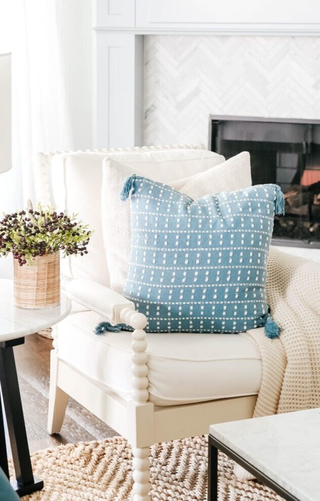 Shop our beautiful new pillow with white stitching to create that coastal decor style in your home. #ShopABlissfulNest #livingroomdecor #pillow #blueandwhite