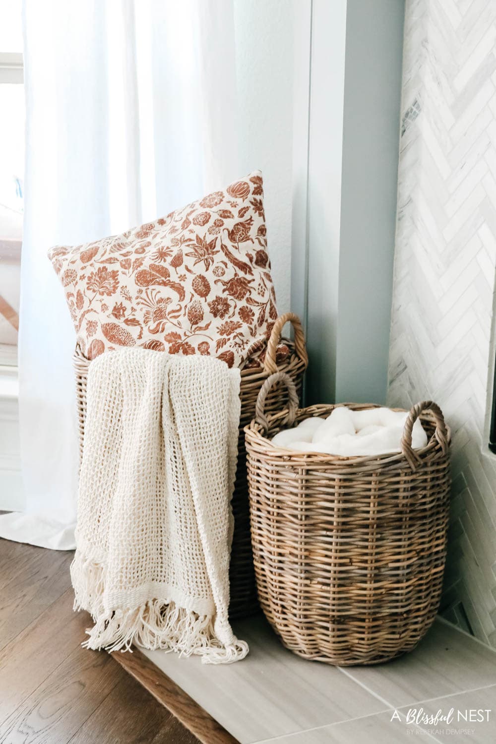Cozy pillows, plush blankets, fall florals, fall decor. #ABlissfulNest #falldecor #falllivingroom