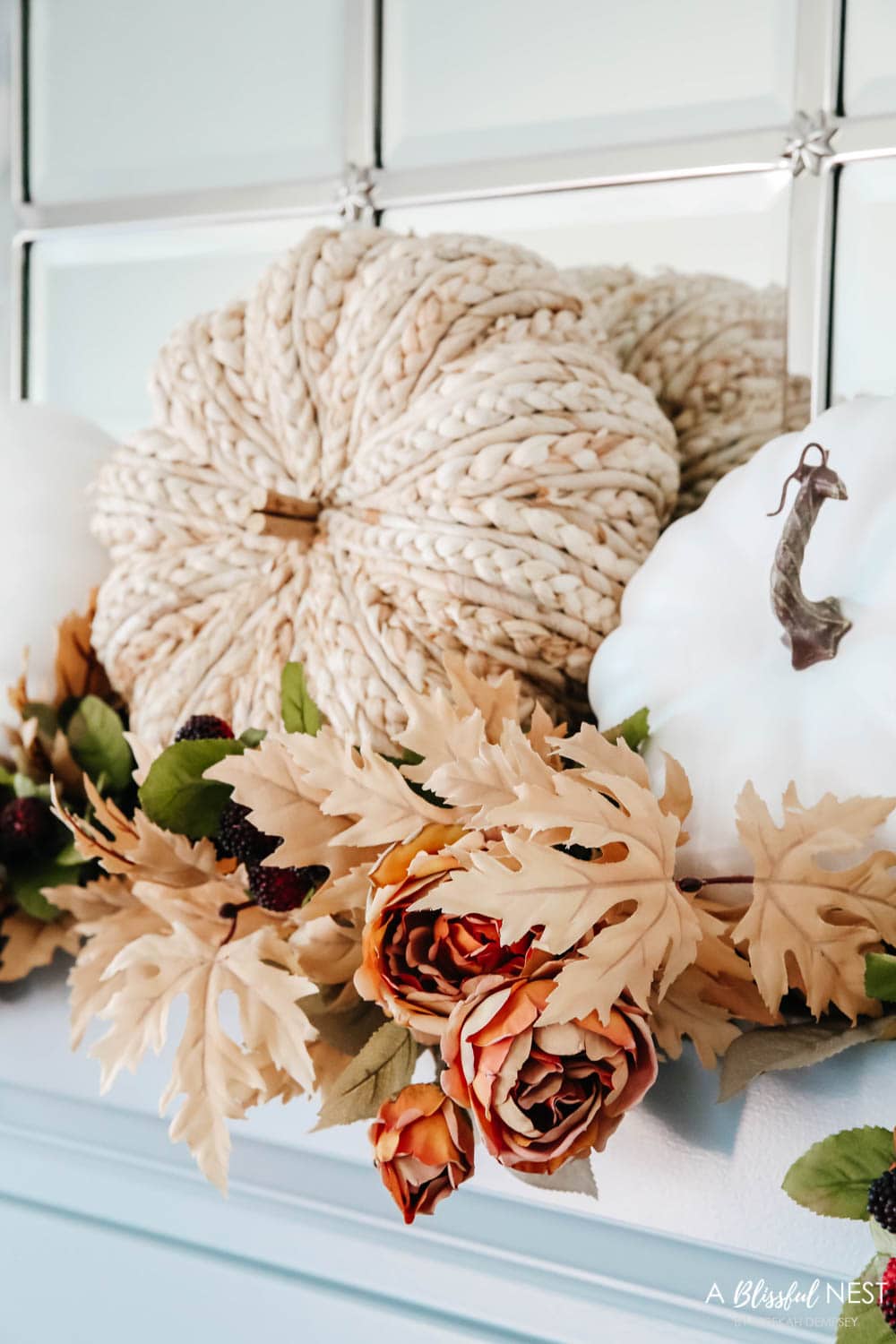 Cozy pillows, plush blankets, fall florals, fall decor. #ABlissfulNest #falldecor #falllivingroom