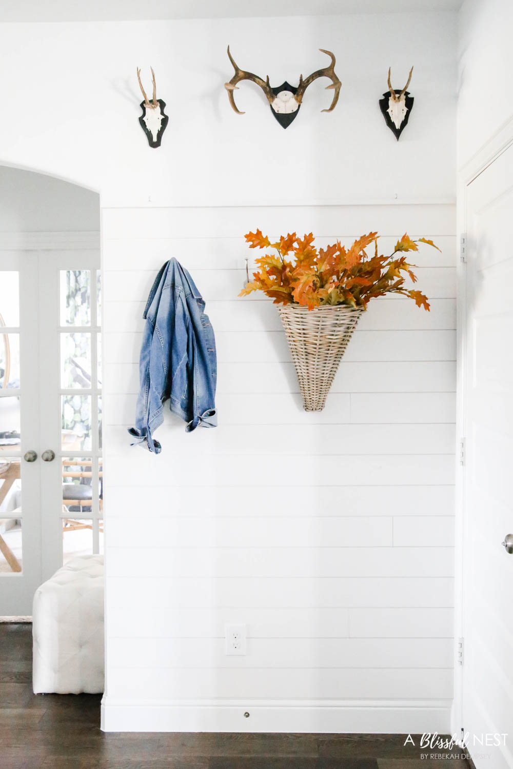 Basket with fall leaves, shiplap wall, mudroom, drop zone details. #ABlissfulNest #falldecor #fallideas