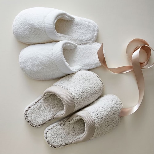 These cozy sherpa slippers are a great holiday gift idea for her! #ABlissfulNest
