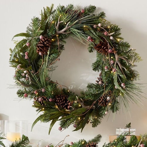 This pre-lit pine wreath has just the right amount of glitz to it for the holiday season! #ABlissfulNest