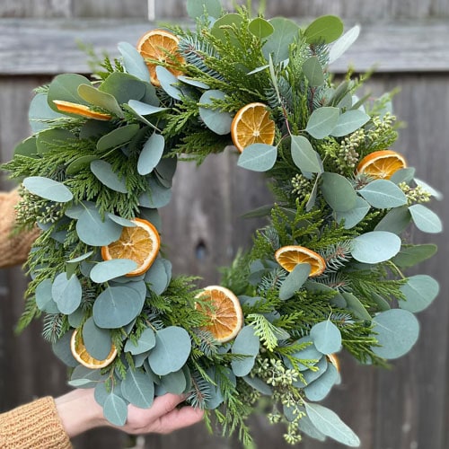This eucalyptus and dried citrus wreath will become a conversation piece in your home this holiday season! #ABlissfulNest