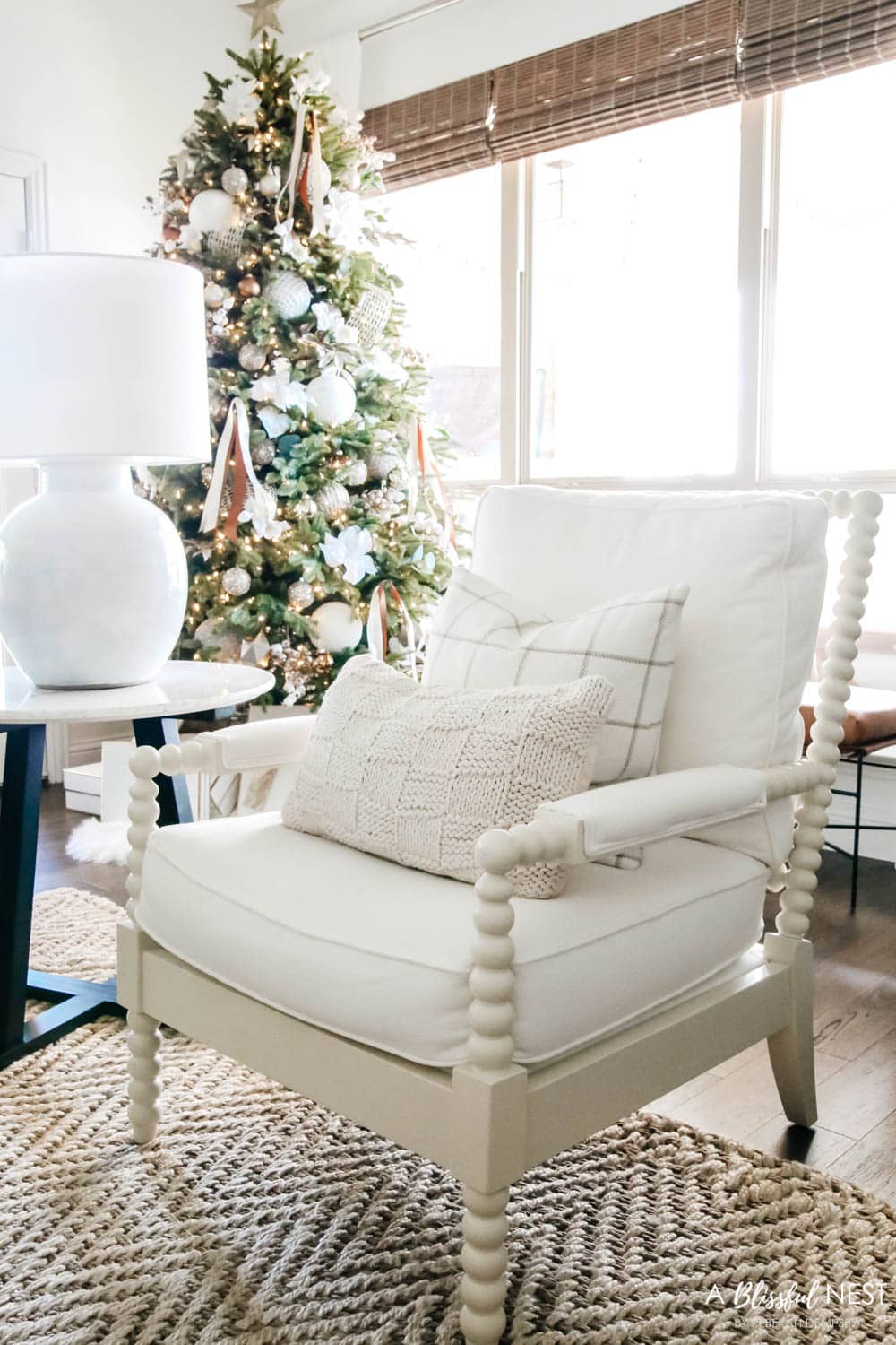 Cream pillows on white spindle chair