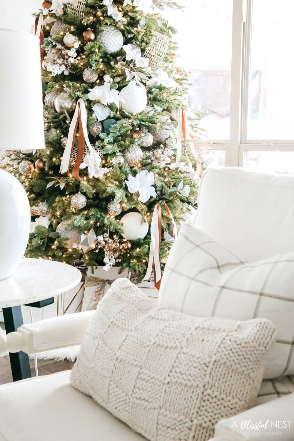 Cream pillows on white spindle chair