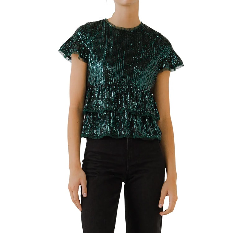 This sequin peplum top is the most perfect holiday top to wear all season long! #ABlissfulNest