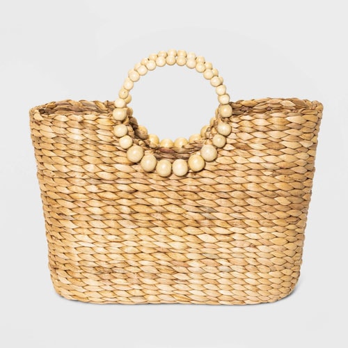 This straw tote is under $50 and a must have for spring and summer! #ABlissfulNest