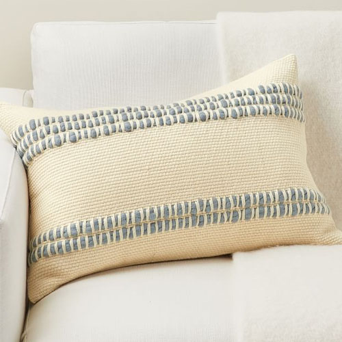 This navy textured lumbar throw pillow is perfect for spring! #ABlissfulNest