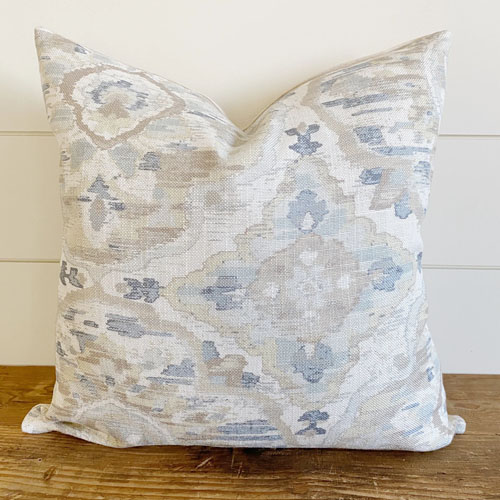 This blue, neutral watercolor throw pillow is perfect for spring! #ABlissfulNest
