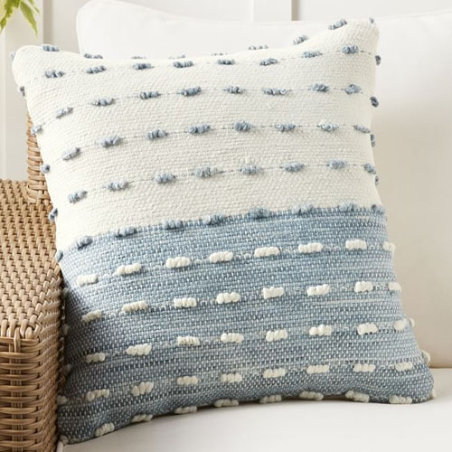 This blue and white textured throw pillow is a must have for spring and summer! #ABlissfulNest