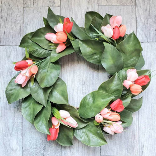 This tulip and magnolia wreath is a beautiful spring wreath for your front door! #ABlissfulNest