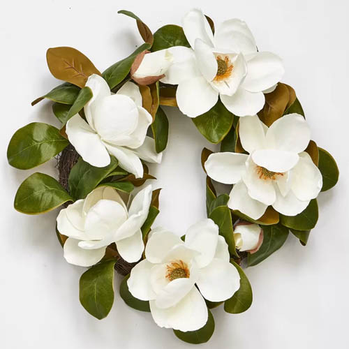 This white magnolia wreath is a beautiful addition to your spring decor! #ABlissfulNest