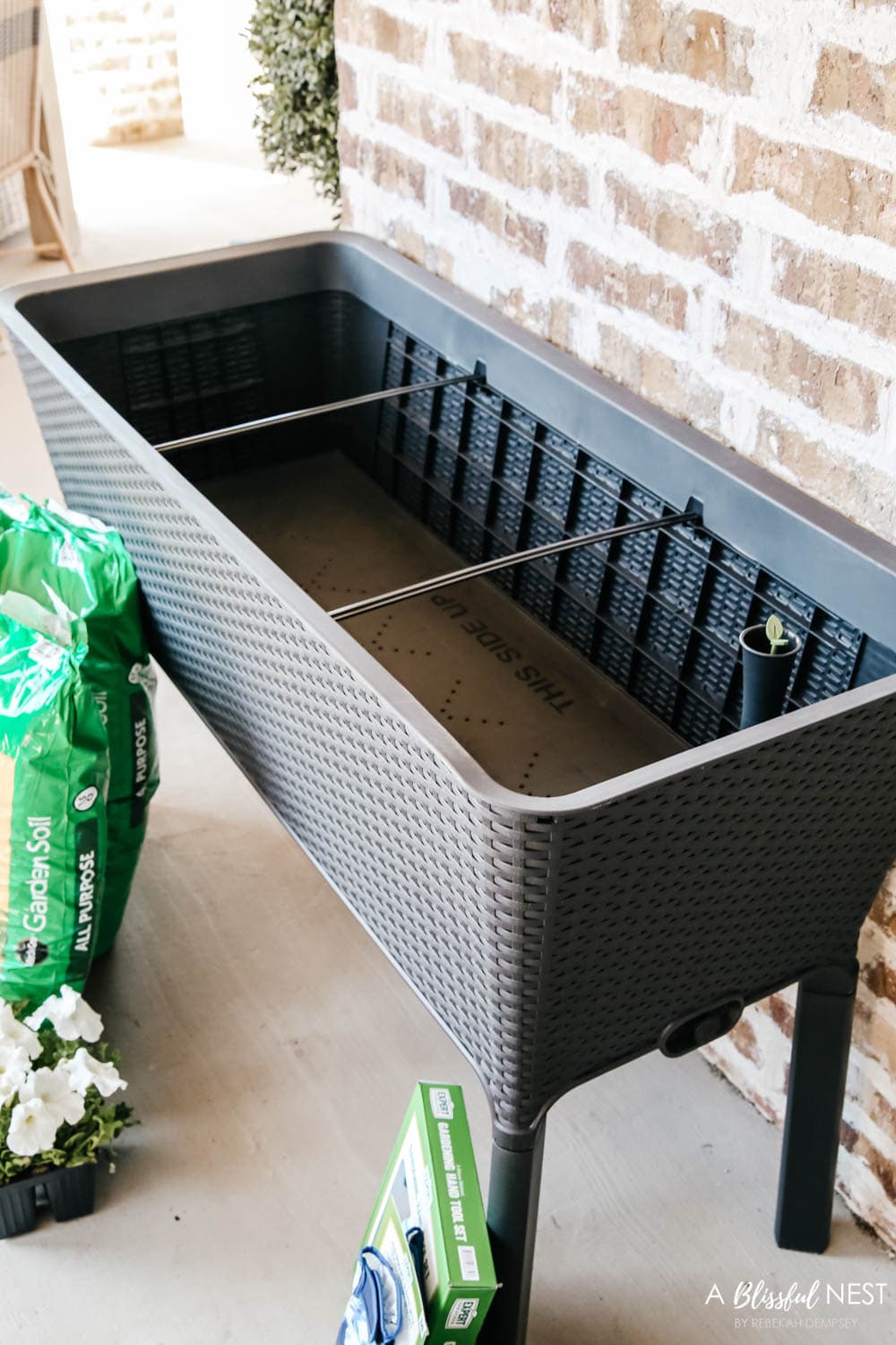 Inside view of a raised garden planter being used on a patio