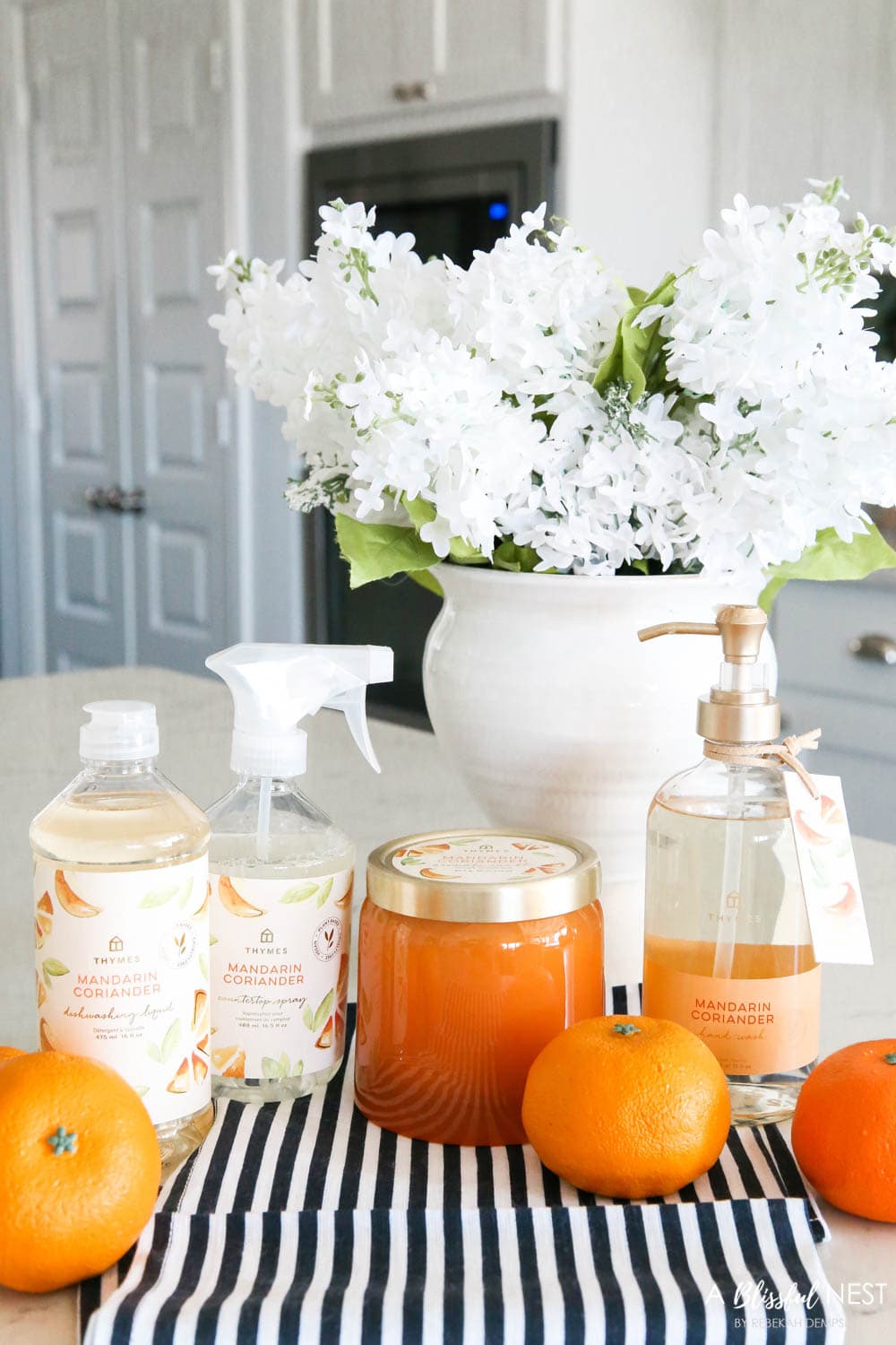 Collection of orange scented kitchen cleaning products 