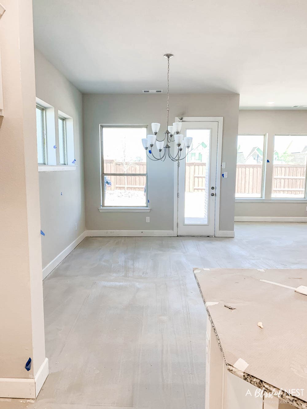 View from kitchen to breakfast room area.