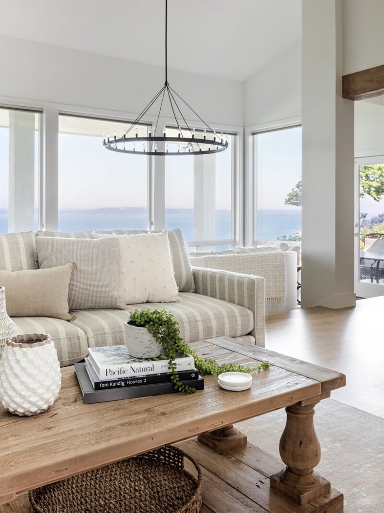 Check out this stunning coastal living space designed by Geneva Ness Design! #ABlissfulNest