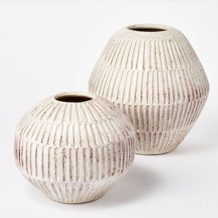 This white terracotta carved vase is a perfect piece of decor for your home! #ABlissfulNest