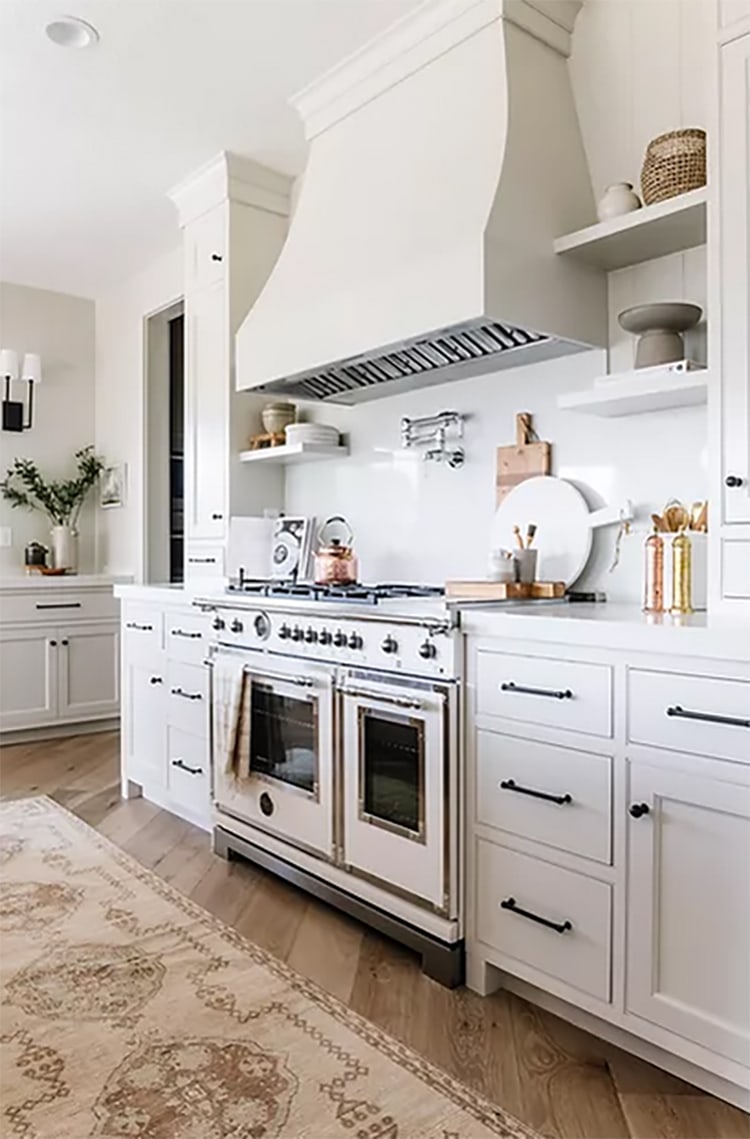 I love this white traditional kitchen designed by Remedy Design Firm! #ABlissfulNest