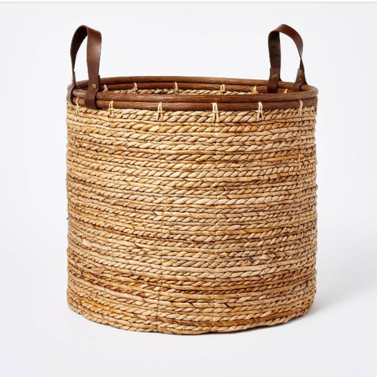 This leather handled basket is perfect to store throw blankets in! #ABlissfulNest