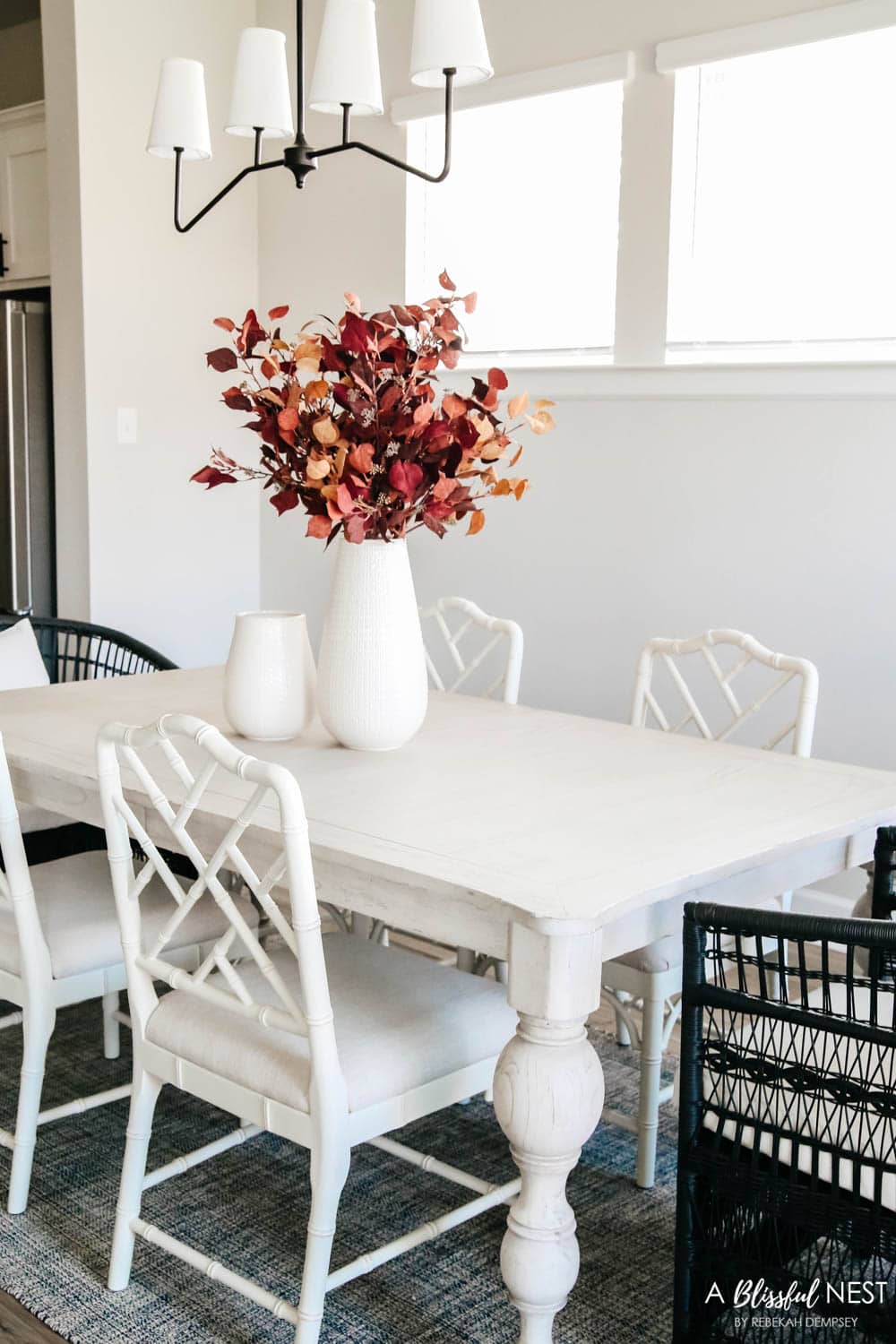 Dining room set with fall decor in amber colored hues