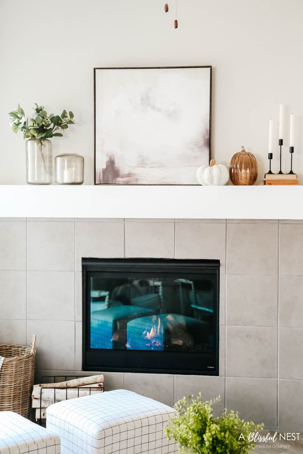 Fall fireplace mantle with neutral toned decor