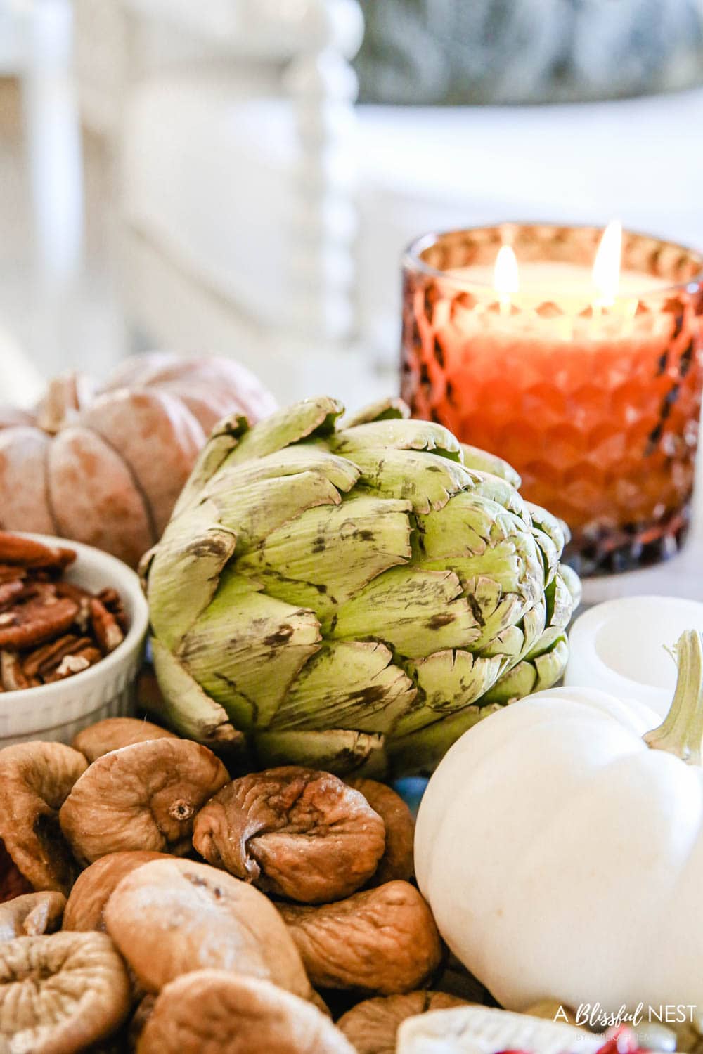 Artichoke and a pumpkin candle