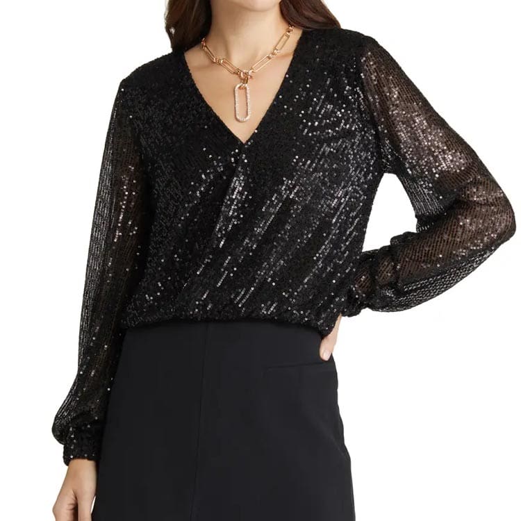 This black sequin wrap top is the perfect holiday top! #ABlissfulNest
