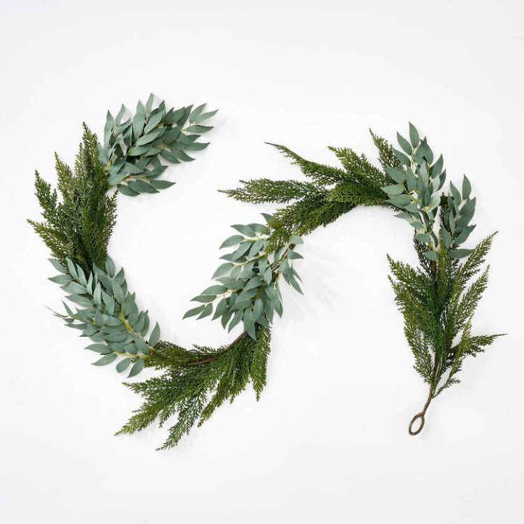 This cedar and eucalyptus garland is perfect to add to your home this holiday season! #ABlissfulNest
